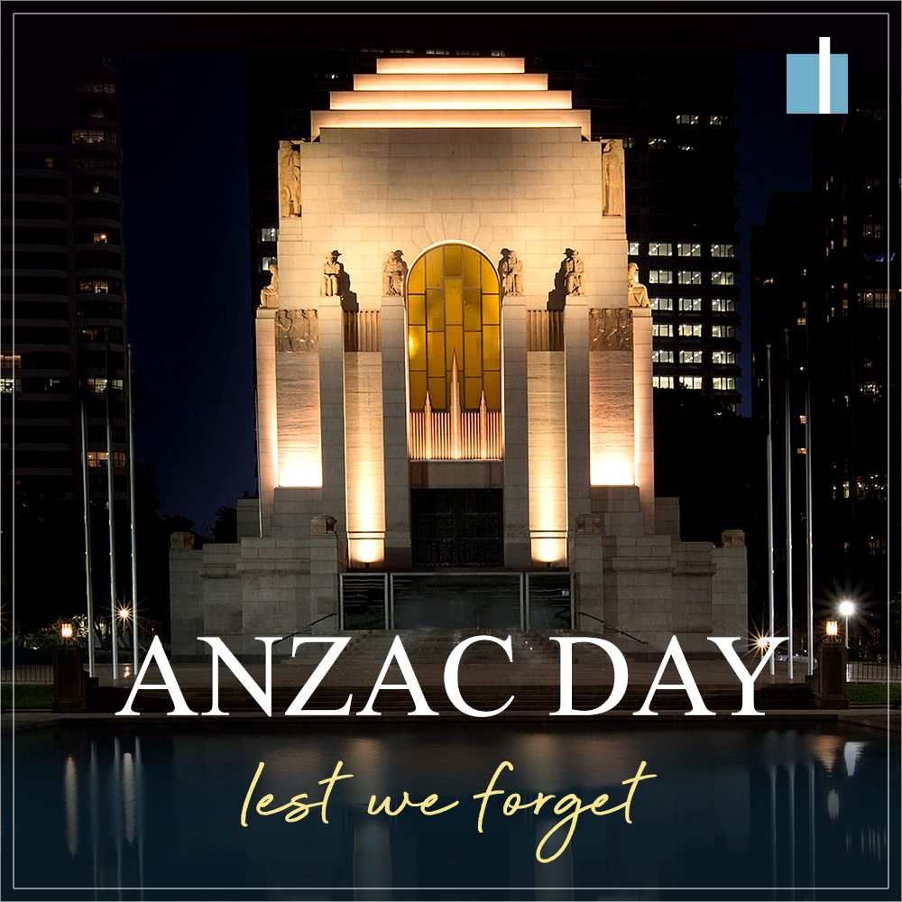 image of memorial building lit up for ANZAC Day